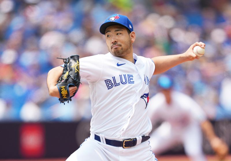 Jul 16, 2023; Toronto, Ontario, CAN; Toronto Blue Jays starting pitcher Yusei Kikuchi (16) throws pitch against the Arizona Diamondbacks during the first inning at Rogers Centre. Mandatory Credit: Nick Turchiaro-USA TODAY Sports