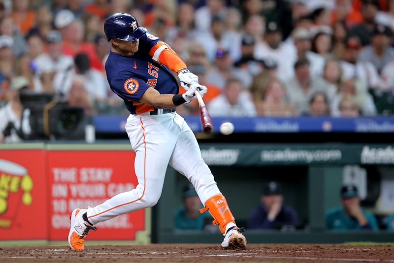 Aug 19, 2023; Houston, Texas, USA; Houston Astros shortstop Jeremy Pena (3) hits a single against the Seattle Mariners during the second inning at Minute Maid Park. Mandatory Credit: Erik Williams-USA TODAY Sports