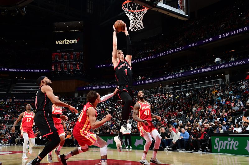 ATLANTA, GA - JANUARY 28: Gradey Dick #1 of the Toronto Raptors dunks the ball during the game against the Atlanta Hawks on January 28, 2024 at State Farm Arena in Atlanta, Georgia.  NOTE TO USER: User expressly acknowledges and agrees that, by downloading and/or using this Photograph, user is consenting to the terms and conditions of the Getty Images License Agreement. Mandatory Copyright Notice: Copyright 2024 NBAE (Photo by Scott Cunningham/NBAE via Getty Images)