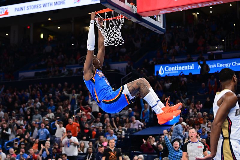 OKLAHOMA CITY, OKLAHOMA - NOVEMBER 13: Jalen Williams #8 of the Oklahoma City Thunder hangs on the rim after a dunk during the second half against the New Orleans Pelicans at Paycom Center on November 13, 2024 in Oklahoma City, Oklahoma. NOTE TO USER: User expressly acknowledges and agrees that, by downloading and or using this photograph, User is consenting to the terms and conditions of the Getty Images License Agreement. (Photo by Joshua Gateley/Getty Images)