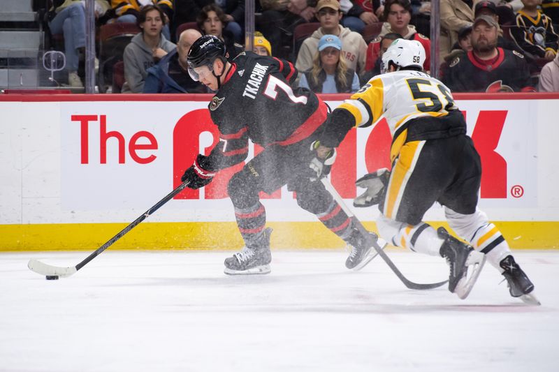 Mar 12, 2024; Ottawa, Ontario, CAN; Ottawa Senators left wing Brady Tkachuk (7) skates with the puck in front of Pittsburgh Penguins defenseman Kris Letang (58) in the first period at the Canadian Tire Centre. Mandatory Credit: Marc DesRosiers-USA TODAY Sports