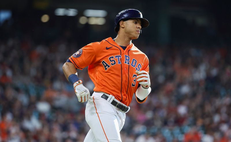 Apr 30, 2023; Houston, Texas, USA; Houston Astros shortstop Jeremy Pena (3) hits a single during the first inning against the Philadelphia Phillies at Minute Maid Park. Mandatory Credit: Troy Taormina-USA TODAY Sports