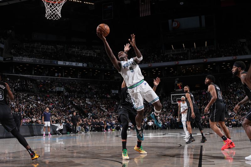 BROOKLYN, NY - JANUARY 25: Anthony Edwards #5 of the Minnesota Timberwolves drives to the basket during the game against the Brooklyn Nets on January 25, 2024 at Barclays Center in Brooklyn, New York. NOTE TO USER: User expressly acknowledges and agrees that, by downloading and or using this Photograph, user is consenting to the terms and conditions of the Getty Images License Agreement. Mandatory Copyright Notice: Copyright 2024 NBAE (Photo by Jesse D. Garrabrant/NBAE via Getty Images)