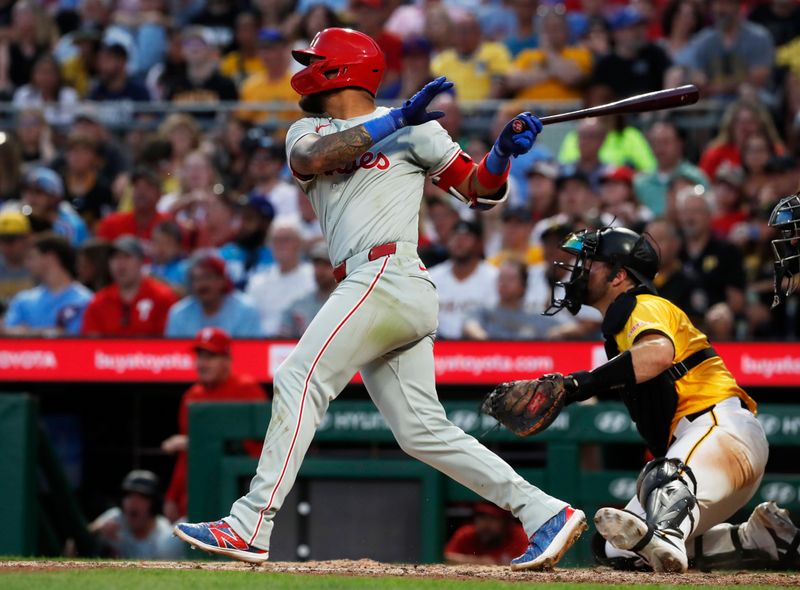 Jul 19, 2024; Pittsburgh, Pennsylvania, USA;  Philadelphia Phillies second baseman Edmundo Sosa (33) hits a single against the Pittsburgh Pirates during the sixth inning at PNC Park. Mandatory Credit: Charles LeClaire-USA TODAY Sports