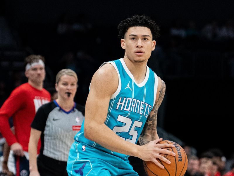 CHARLOTTE, NORTH CAROLINA - FEBRUARY 03: KJ Simpson #25 of the Charlotte Hornets plays against the Washington Wizards during their game at Spectrum Center on February 03, 2025 in Charlotte, North Carolina. NOTE TO USER: User expressly acknowledges and agrees that, by downloading and or using this photograph, User is consenting to the terms and conditions of the Getty Images License Agreement. (Photo by Jacob Kupferman/Getty Images)