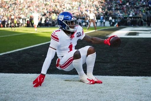 New York Giants wide receiver Malik Nabers reacts after scoring a touchdown during the second half of an NFL football game against the Philadelphia Eagles on Sunday, Jan. 5, 2025, in Philadelphia. (AP Photo/Matt Slocum)