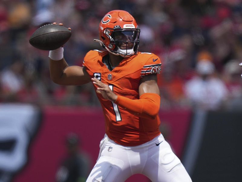 Chicago Bears quarterback Justin Fields (1) makes a pass attempt during an NFL football game against the Tampa Bay Buccaneers, Sunday, Sept. 17, 2023, in Tampa, Fla. (AP Photo/Peter Joneleit)