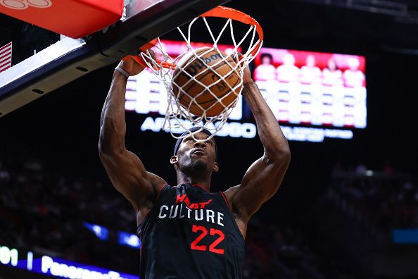 MIAMI, FLORIDA - DECEMBER 16: Jimmy Butler #22 of the Miami Heat dunks the ball against the Chicago Bulls during the first quarter of the game at Kaseya Center on December 16, 2023 in Miami, Florida. NOTE TO USER: User expressly acknowledges and agrees that, by downloading and or using this photograph, User is consenting to the terms and conditions of the Getty Images License Agreement. (Photo by Megan Briggs/Getty Images)