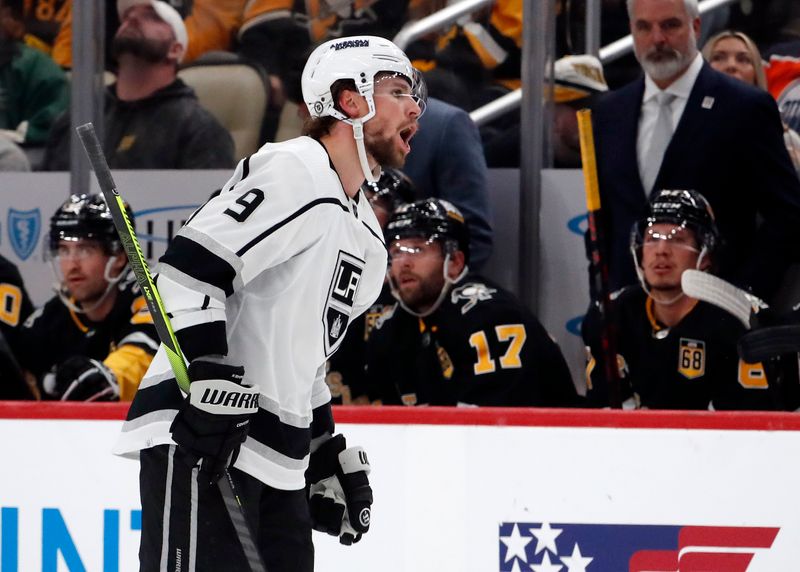 Feb 18, 2024; Pittsburgh, Pennsylvania, USA;  Los Angeles Kings right wing Adrian Kempe (9) reacts after scoring the game winning goal against the Pittsburgh Penguins during the third period at PPG Paints Arena. Los Angeles won 2-1. Mandatory Credit: Charles LeClaire-USA TODAY Sports