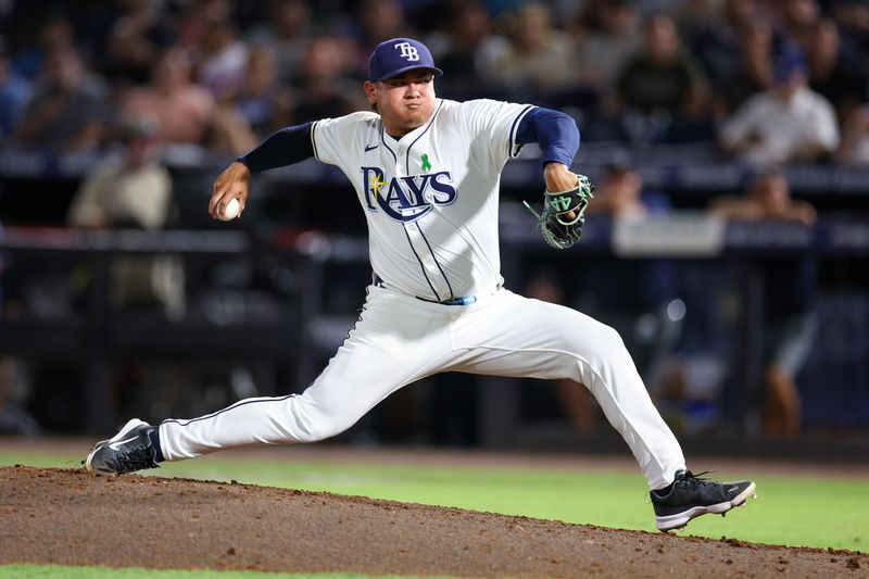 May 19, 2025; Tampa, Florida, USA; Tampa Bay Rays pitcher Manuel Rodríguez (39) throws a pitch against the Houston Astros in the seventh inning at George M. Steinbrenner Field. Mandatory Credit: Nathan Ray Seebeck-Imagn Images