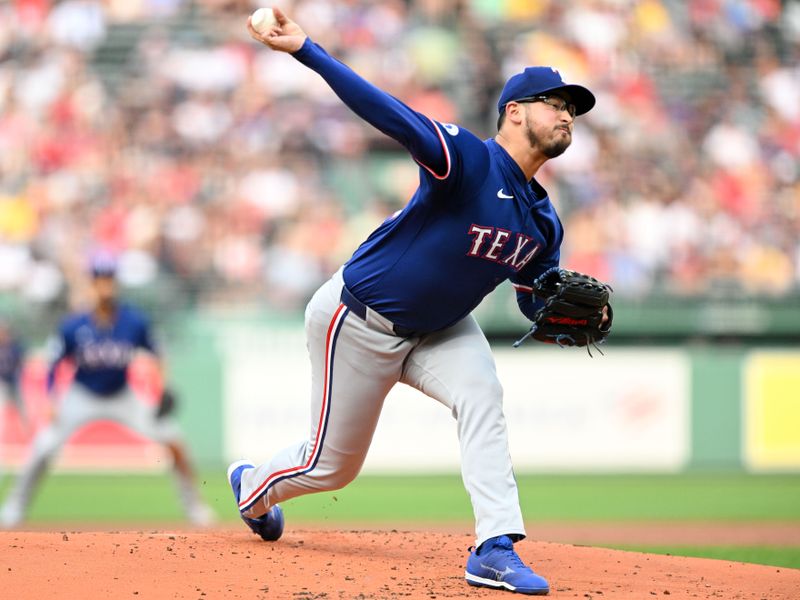 Aug 14, 2024; Boston, Massachusetts, USA; Texas Rangers starting pitcher Dane Dunning (33) pitches against the Boston Red Sox during the first inning at Fenway Park. Mandatory Credit: Brian Fluharty-USA TODAY Sports