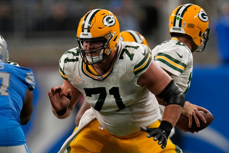 Green Bay Packers center Josh Myers (71) plays against the Detroit Lions during an NFL football game in Detroit, Sunday, Nov. 6, 2022. (AP Photo/Paul Sancya)