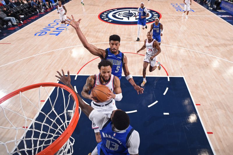 INGLEWOOD, CA - OCTOBER 14: Amir Coffey #7 of the LA Clippers drives to the basket during the game against the Dallas Mavericks on October 14, 2024 at Intuit Dome in Los Angeles, California. NOTE TO USER: User expressly acknowledges and agrees that, by downloading and/or using this Photograph, user is consenting to the terms and conditions of the Getty Images License Agreement. Mandatory Copyright Notice: Copyright 2024 NBAE (Photo by Juan Ocampo/NBAE via Getty Images)