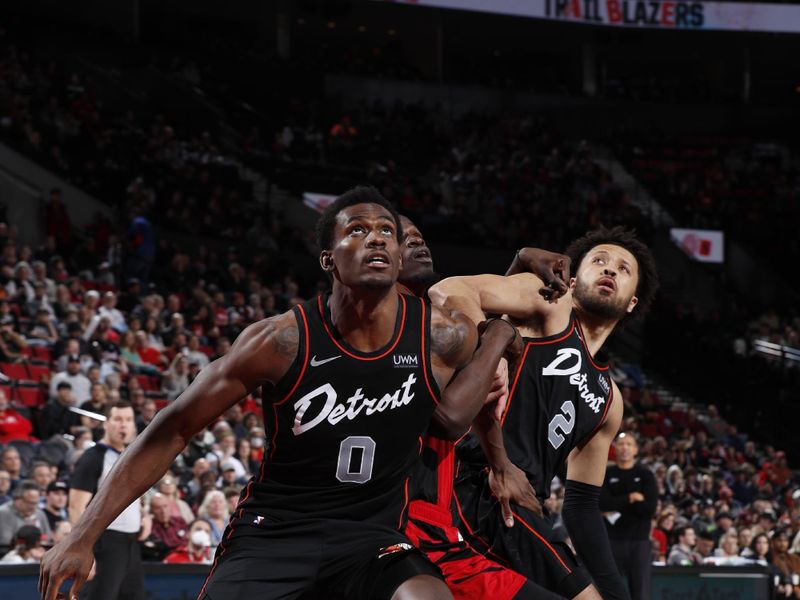 PORTLAND, OR - FEBRUARY 8: Jalen Duren #0 and Cade Cunningham #2 of the Detroit Pistons box out against Ibou Badji #41 of the Portland Trail Blazers during the game on February 8, 2024 at the Moda Center Arena in Portland, Oregon. NOTE TO USER: User expressly acknowledges and agrees that, by downloading and or using this photograph, user is consenting to the terms and conditions of the Getty Images License Agreement. Mandatory Copyright Notice: Copyright 2024 NBAE (Photo by Cameron Browne/NBAE via Getty Images)