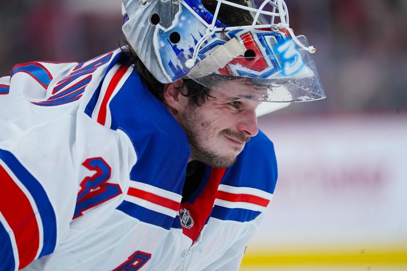 Nov 27, 2024; Raleigh, North Carolina, USA;  New York Rangers goaltender Igor Shesterkin (31) looks on against the Carolina Hurricanes during the first period at Lenovo Center. Mandatory Credit: James Guillory-Imagn Images