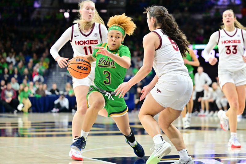 Feb 29, 2024; South Bend, Indiana, USA; Notre Dame Fighting Irish guard Hannah Hidalgo (3) drives to the basket as Virginia Tech Hokies guard Georgia Amoore (5) defends in the second half at the Purcell Pavilion. Mandatory Credit: Matt Cashore-USA TODAY Sports