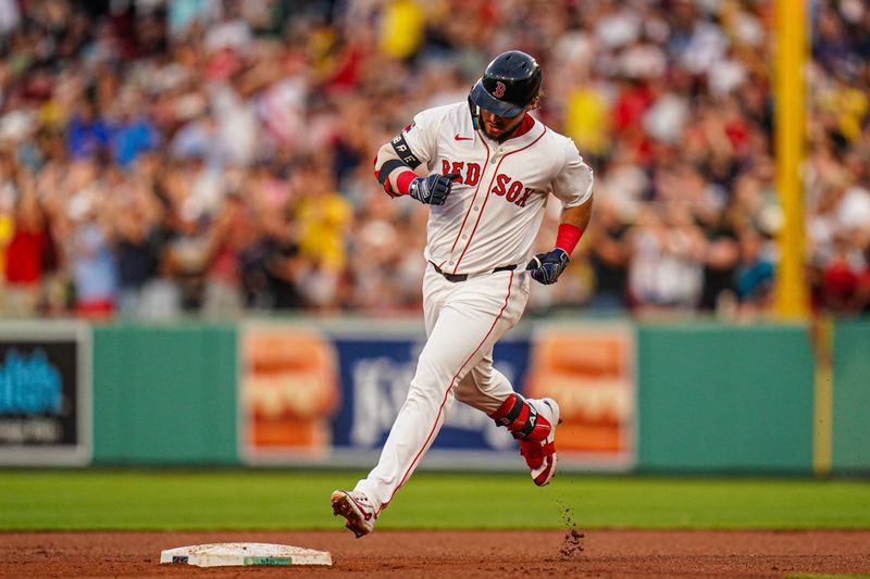 Jul 11, 2024; Boston, Massachusetts, USA; Boston Red Sox right fielder Wilyer Abreu (52) hits a home run against the Oakland Athletics in the fourth inning at Fenway Park. Mandatory Credit: David Butler II-USA TODAY Sports