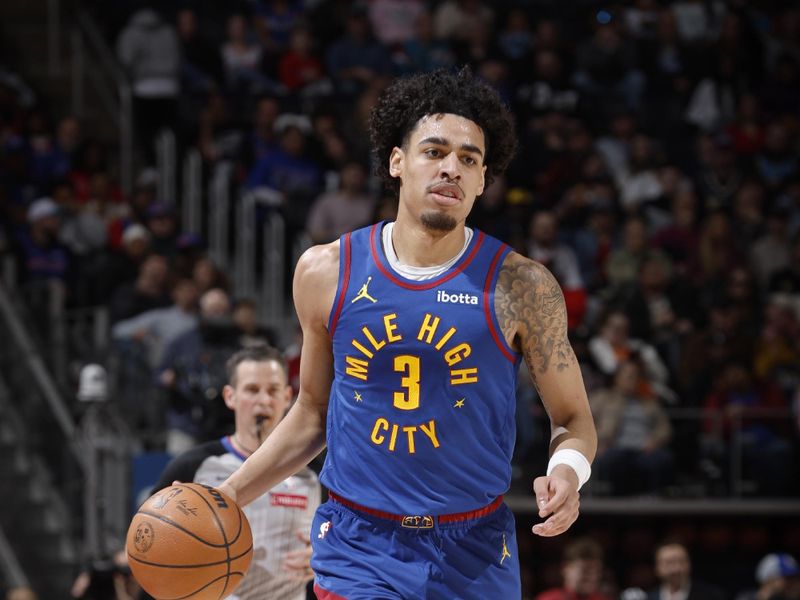 DETROIT, MI - FEBRUARY 28: Julian Strawther #3 of the Denver Nuggets dribbles the ball during the game against the Detroit Pistons on February 28, 2025 at Little Caesars Arena in Detroit, Michigan. NOTE TO USER: User expressly acknowledges and agrees that, by downloading and/or using this photograph, User is consenting to the terms and conditions of the Getty Images License Agreement. Mandatory Copyright Notice: Copyright 2025 NBAE (Photo by Brian Sevald/NBAE via Getty Images)