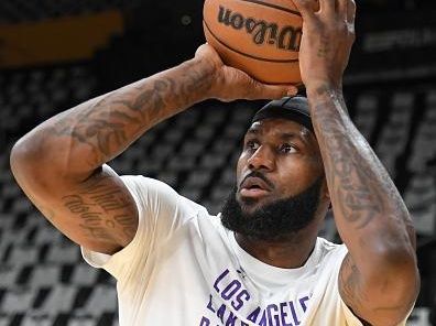 LOS ANGELES, CA - DECEMBER 25: LeBron James #23 of the Los Angeles Lakers warms-up before the game  on December 25, 2023 at Crypto.Com Arena in Los Angeles, California. NOTE TO USER: User expressly acknowledges and agrees that, by downloading and/or using this Photograph, user is consenting to the terms and conditions of the Getty Images License Agreement. Mandatory Copyright Notice: Copyright 2023 NBAE (Photo by Juan Ocampo/NBAE via Getty Images)