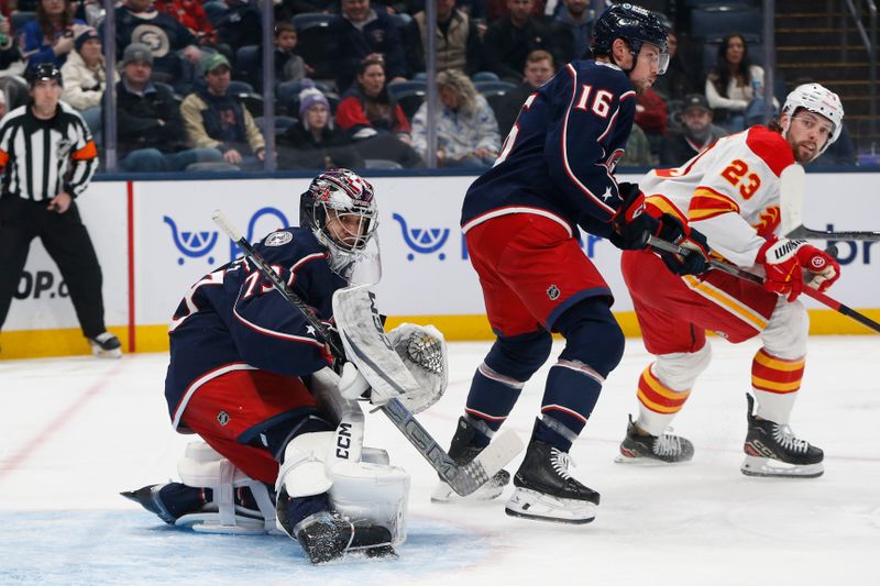 Jan 13, 2026; Columbus, Ohio, USA; Columbus Blue Jackets goalie Jet Greaves (73) makes a pad save against the Calgary Flames during the first period at Nationwide Arena. Mandatory Credit: Russell LaBounty-Imagn Images