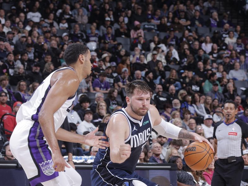 SACRAMENTO, CA - MARCH 29:  Luka Doncic #77 of the Dallas Mavericks handles the ball during the game  on March 29, 2024 at Golden 1 Center in Sacramento, California. NOTE TO USER: User expressly acknowledges and agrees that, by downloading and or using this Photograph, user is consenting to the terms and conditions of the Getty Images License Agreement. Mandatory Copyright Notice: Copyright 2024 NBAE (Photo by Rocky Widner/NBAE via Getty Images)