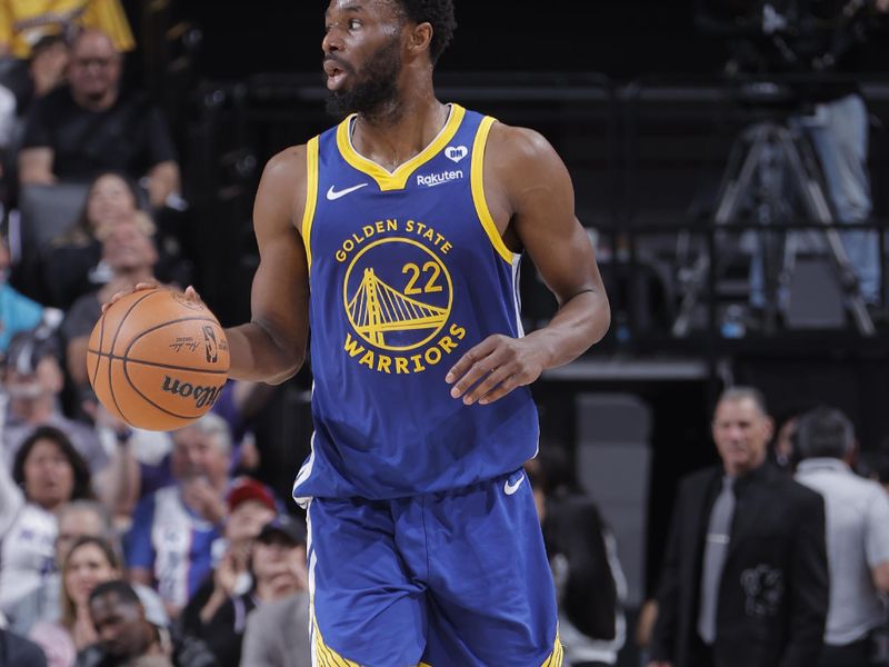 SACRAMENTO, CA - APRIL 16: Andrew Wiggins #22 of the Golden State Warriors dribbles the ball during the game against the Sacramento Kings during the 2024 Play-In Tournament on April 16, 2024 at Golden 1 Center in Sacramento, California. NOTE TO USER: User expressly acknowledges and agrees that, by downloading and or using this Photograph, user is consenting to the terms and conditions of the Getty Images License Agreement. Mandatory Copyright Notice: Copyright 2024 NBAE (Photo by Rocky Widner/NBAE via Getty Images)