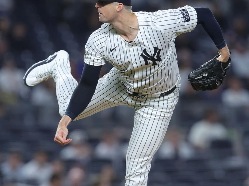 May 20, 2024; Bronx, New York, USA; New York Yankees relief pitcher Clay Holmes (35) follows through on a pitch against the Seattle Mariners during the ninth inning at Yankee Stadium. Mandatory Credit: Brad Penner-USA TODAY Sports