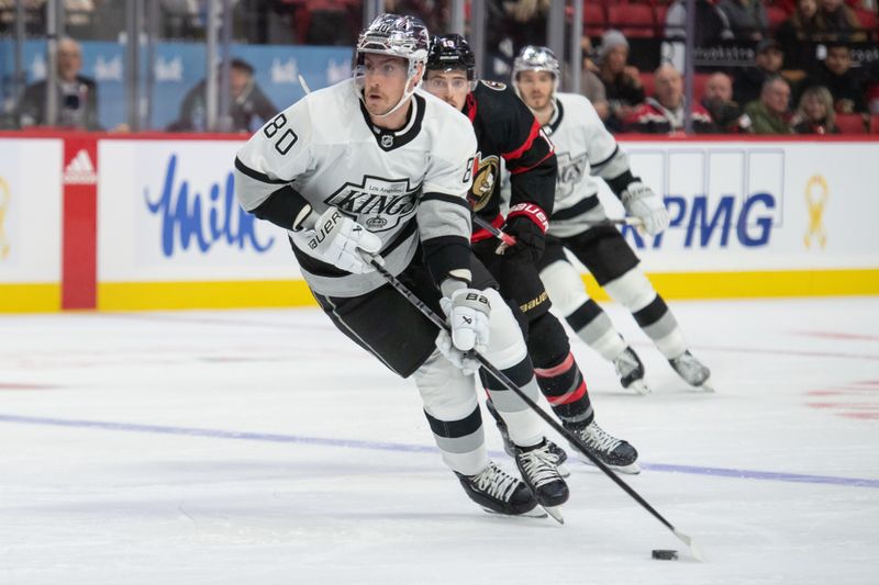 Nov 2, 2023; Ottawa, Ontario, CAN; Los Angeles Kings center Pierre-Luc Dubois (80) skates with the puck in the second period against the Ottawa Senators at the Canadian Tire Centre. Mandatory Credit: Marc DesRosiers-USA TODAY Sports