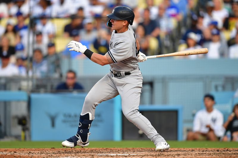 Jun 4, 2023; Los Angeles, California, USA; New York Yankees right fielder Jake Bauers (61) at bat against the Los Angeles Dodgers during the ninth inning at Dodger Stadium. Mandatory Credit: Gary A. Vasquez-USA TODAY Sports