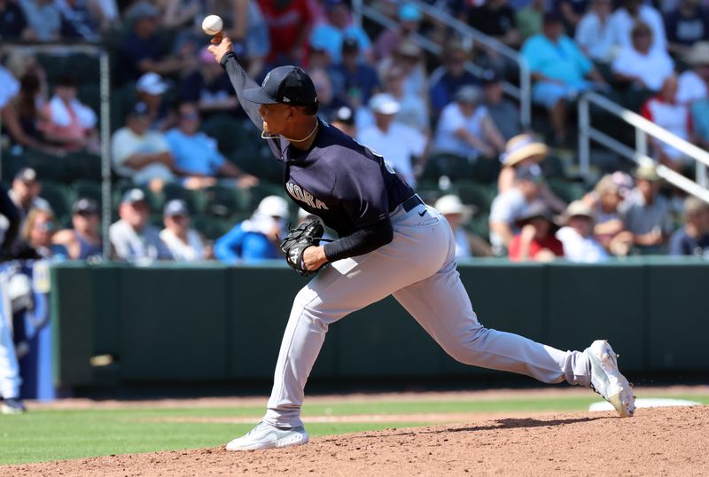 Mar 5, 2023; North Port, Florida, USA; New York Yankees relief pitcher Albert Abreu (84) throws a pitch against the Atlanta Braves during the fourth inning at CoolToday Park. Mandatory Credit: Kim Klement-USA TODAY Sports