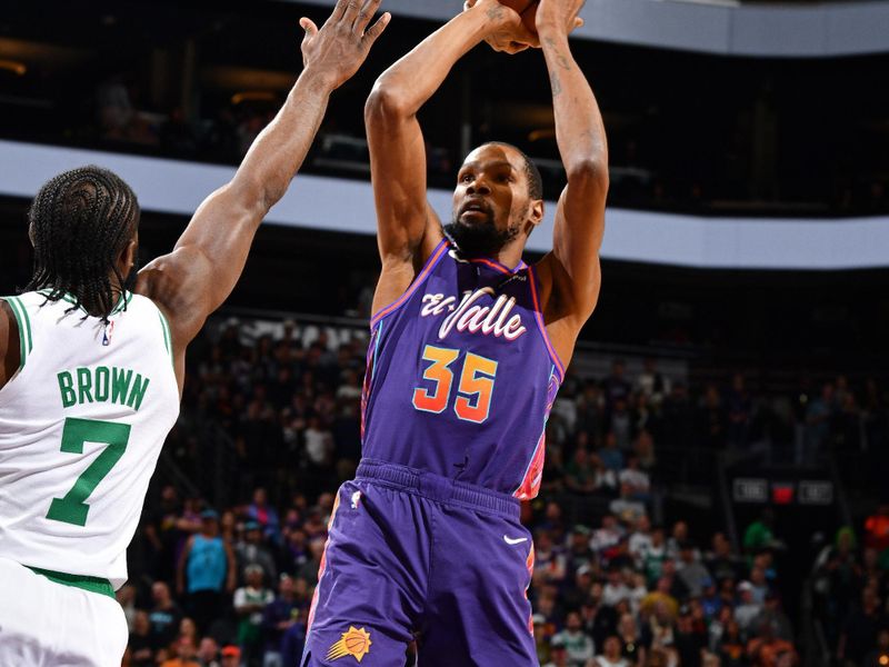 PHOENIX, AZ - MARCH 9: Kevin Durant #35 of the Phoenix Suns shoots the ball during the game against the Boston Celtics on March 9, 2024 at Footprint Center in Phoenix, Arizona. NOTE TO USER: User expressly acknowledges and agrees that, by downloading and or using this photograph, user is consenting to the terms and conditions of the Getty Images License Agreement. Mandatory Copyright Notice: Copyright 2024 NBAE (Photo by Barry Gossage/NBAE via Getty Images)