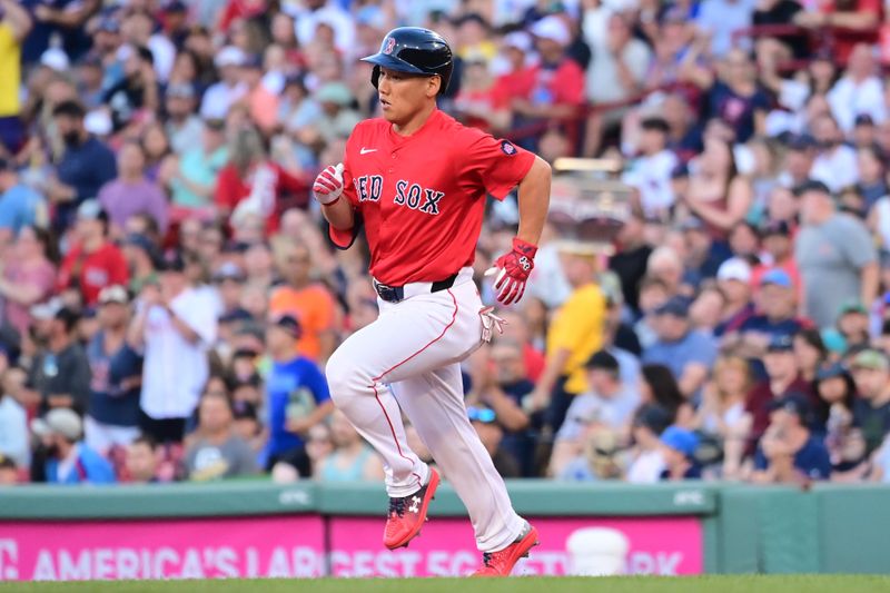 Jun 28, 2024; Boston, Massachusetts, USA; Boston Red Sox designated hitter Masataka Yoshida (7) runs to second base during the second inning at Fenway Park. Mandatory Credit: Eric Canha-USA TODAY Sports