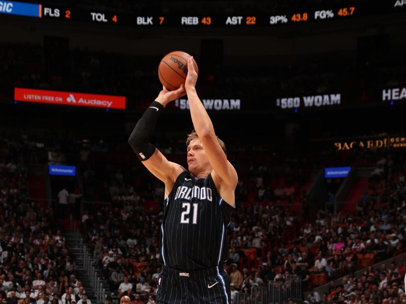 MIAMI, FL - OCTOBER 23: Moritz Wagner #21 of the Orlando Magic shoots a three point basket during the game against the Miami Heat on October 23, 2024 at Kaseya Center in Miami, Florida. NOTE TO USER: User expressly acknowledges and agrees that, by downloading and or using this Photograph, user is consenting to the terms and conditions of the Getty Images License Agreement. Mandatory Copyright Notice: Copyright 2024 NBAE (Photo by Issac Baldizon/NBAE via Getty Images)