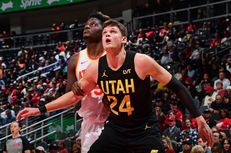 ATLANTA, GA - FEBRUARY 27: Walker Kessler #24 of the Utah Jazz boxes out during the game against the Atlanta Hawks on February 27, 2024 at State Farm Arena in Atlanta, Georgia.  NOTE TO USER: User expressly acknowledges and agrees that, by downloading and/or using this Photograph, user is consenting to the terms and conditions of the Getty Images License Agreement. Mandatory Copyright Notice: Copyright 2024 NBAE (Photo by Scott Cunningham/NBAE via Getty Images)