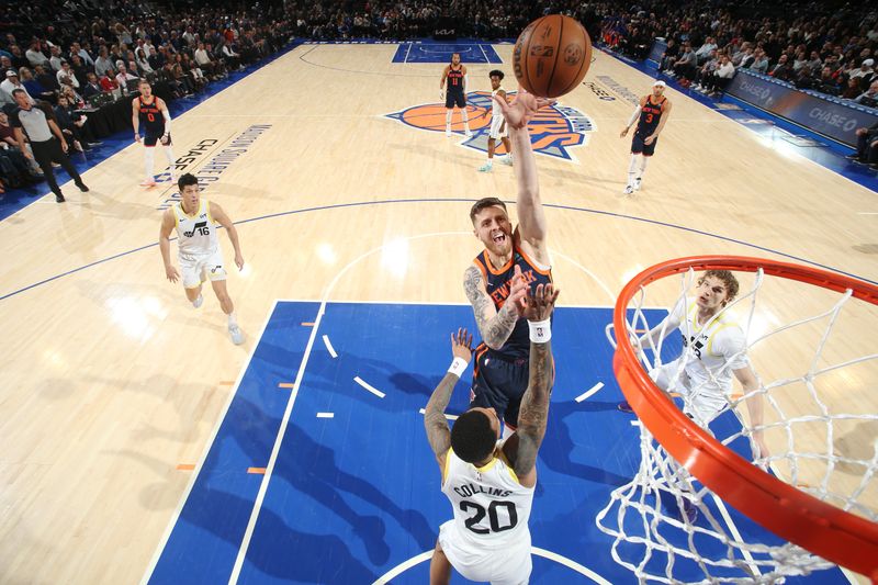 NEW YORK, NY - JANUARY 30: Isaiah Hartenstein #55 of the New York Knicks shoots the ball during the game against the Utah Jazz on January 30, 2024 at Madison Square Garden in New York City, New York.  NOTE TO USER: User expressly acknowledges and agrees that, by downloading and or using this photograph, User is consenting to the terms and conditions of the Getty Images License Agreement. Mandatory Copyright Notice: Copyright 2024 NBAE  (Photo by Nathaniel S. Butler/NBAE via Getty Images)