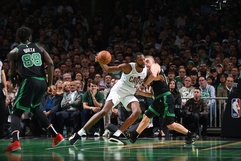 BOSTON, MA - NOVEMBER 19:   Evan Mobley #4 of the Cleveland Cavaliers dribbles the ball during the game against the Boston Celtics during the Emirates NBA Cup game on November 19, 2024 at TD Garden in Boston, Massachusetts. NOTE TO USER: User expressly acknowledges and agrees that, by downloading and/or using this Photograph, user is consenting to the terms and conditions of the Getty Images License Agreement. Mandatory Copyright Notice: Copyright 2024 NBAE (Photo by Brian Babineau/NBAE via Getty Images)