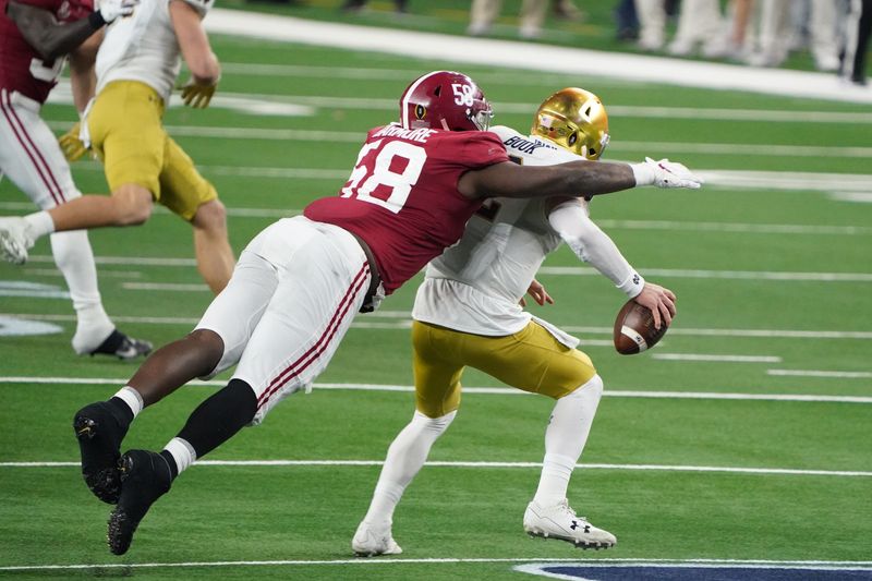 Jan 1, 2021; Arlington, TX, USA;  Alabama Crimson Tide defensive lineman Christian Barmore (58) sacks Notre Dame Fighting Irish quarterback Ian Book (12) in the third quarter during the Rose Bowl at AT&T Stadium. Mandatory Credit: Kirby Lee-USA TODAY Sports