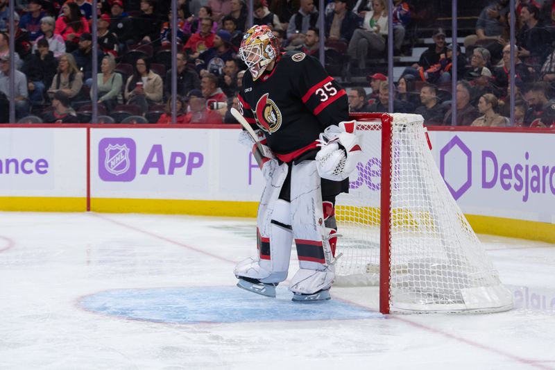 Nov 19, 2024; Ottawa, Ontario, CAN; Ottawa Senators goalie Linus Ullmark (35) stretches after letting in a goal in the second period against the Edmonton Oilers at the Canadian Tire Centre. Mandatory Credit: Marc DesRosiers-Imagn Images