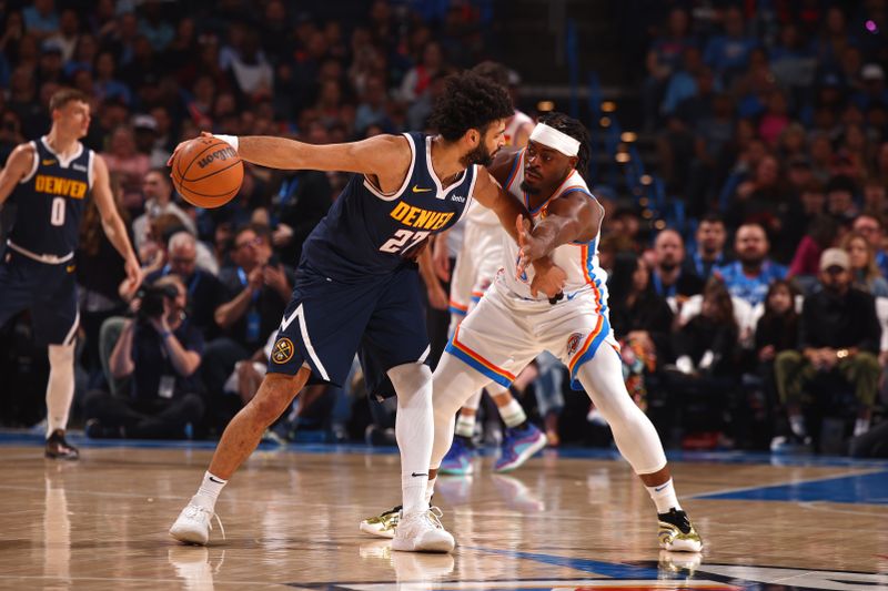 OKLAHOMA CITY, OK - MARCH 10: Luguentz Dort #5 of the Oklahoma City Thunder plays defense during the game against the Denver Nuggets on March 10, 2025 at Paycom Center in Oklahoma City, Oklahoma. NOTE TO USER: User expressly acknowledges and agrees that, by downloading and or using this photograph, User is consenting to the terms and conditions of the Getty Images License Agreement. Mandatory Copyright Notice: Copyright 2025 NBAE(Photo by Zach Beeker/NBAE via Getty Images)