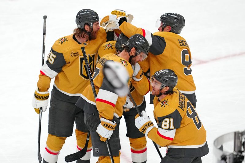 Mar 9, 2024; Las Vegas, Nevada, USA; Vegas Golden Knights right wing Jonathan Marchessault (81) celebrates with team mates after scoring his third goal of the game against the Detroit Red Wings during the third period at T-Mobile Arena. Mandatory Credit: Stephen R. Sylvanie-USA TODAY Sports