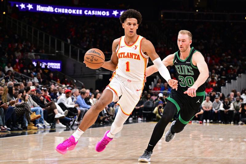 ATLANTA, GA - NOVEMBER 4: Jalen Johnson #1 of the Atlanta Hawks handles the ball during the game against the Boston Celtics on November 4, 2024 at State Farm Arena in Atlanta, Georgia.  NOTE TO USER: User expressly acknowledges and agrees that, by downloading and/or using this Photograph, user is consenting to the terms and conditions of the Getty Images License Agreement. Mandatory Copyright Notice: Copyright 2024 NBAE (Photo by Adam Hagy/NBAE via Getty Images)