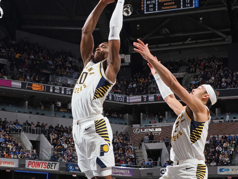 INDIANAPOLIS, IN - FEBRUARY 25: Bennedict Mathurin #00 of the Indiana Pacers grabs a rebound during the game against the Dallas Mavericks on February 25, 2024 at Gainbridge Fieldhouse in Indianapolis, Indiana. NOTE TO USER: User expressly acknowledges and agrees that, by downloading and or using this Photograph, user is consenting to the terms and conditions of the Getty Images License Agreement. Mandatory Copyright Notice: Copyright 2024 NBAE (Photo by Ron Hoskins/NBAE via Getty Images)