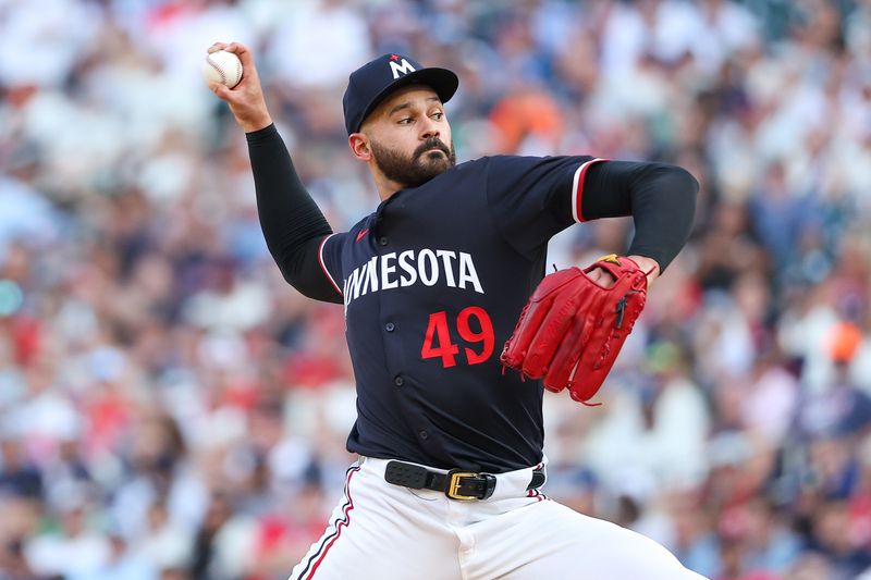 Aug 24, 2024; Minneapolis, Minnesota, USA; Minnesota Twins starting pitcher Pablo Lopez (49) delivers a pitch against the St. Louis Cardinals during the first inning at Target Field. Mandatory Credit: Matt Krohn-USA TODAY Sports