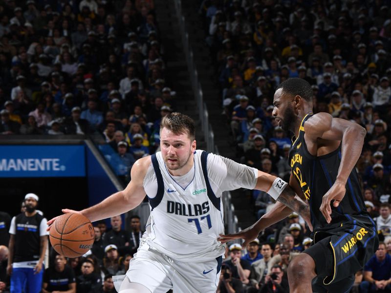 SAN FRANCISCO, CA - NOVEMBER 12: Luka Doncic #77 of the Dallas Mavericks drives to the basket during the game against the Golden State Warriors during the Emirates NBA Cup game on November 12, 2024 at Chase Center in San Francisco, California. NOTE TO USER: User expressly acknowledges and agrees that, by downloading and or using this photograph, user is consenting to the terms and conditions of Getty Images License Agreement. Mandatory Copyright Notice: Copyright 2024 NBAE (Photo by Noah Graham/NBAE via Getty Images)