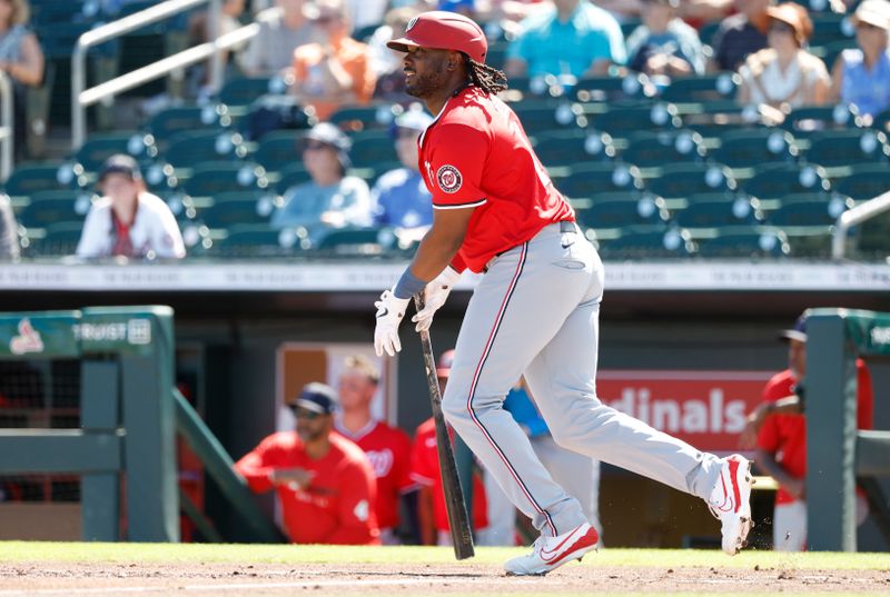 Feb 25, 2025; Jupiter, Florida, USA;  Washington Nationals first baseman Josh Bell (19) heads to first base after hitting a RBI single against the Miami Marlins during the first inning at Roger Dean Chevrolet Stadium. Mandatory Credit: Rhona Wise-Imagn Image 