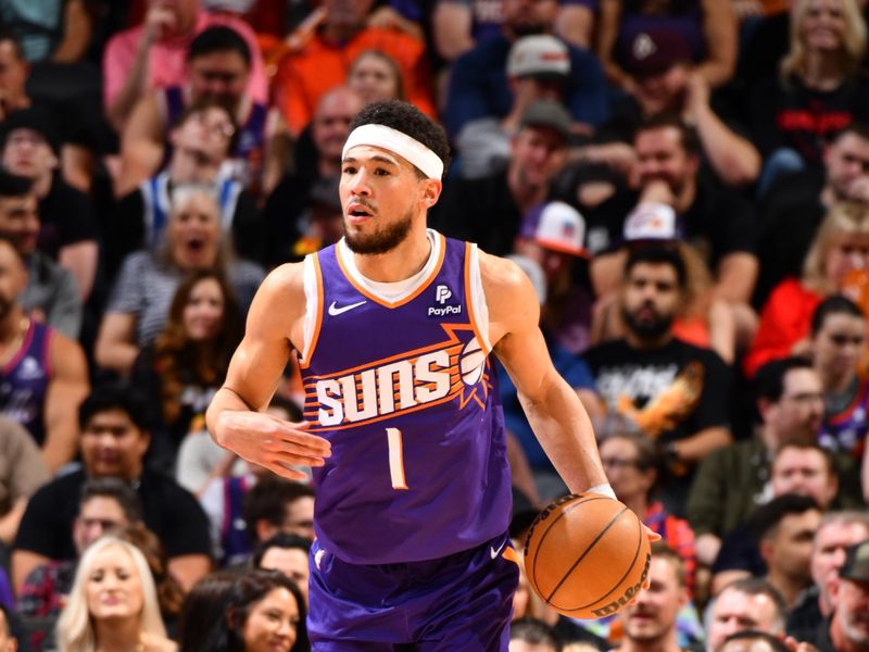 PHOENIX, AZ - MARCH 21:  Devin Booker #1 of the Phoenix Suns handles the ball during the game  on March 21, 2024 at Footprint Center in Phoenix, Arizona. NOTE TO USER: User expressly acknowledges and agrees that, by downloading and or using this photograph, user is consenting to the terms and conditions of the Getty Images License Agreement. Mandatory Copyright Notice: Copyright 2024 NBAE (Photo by Barry Gossage/NBAE via Getty Images)