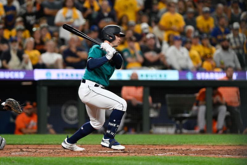 Aug 12, 2023; Seattle, Washington, USA; Seattle Mariners left fielder Cade Marlowe (18) hits a single against the Baltimore Orioles during the ninth inning at T-Mobile Park. Mandatory Credit: Steven Bisig-USA TODAY Sports