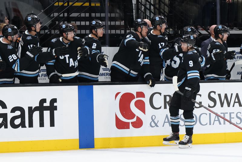 Oct 30, 2024; Salt Lake City, Utah, USA; Utah Hockey Club center Clayton Keller (9) reacts after he scored a goal against the Calgary Flames during the third period at Delta Center. Mandatory Credit: Rob Gray-Imagn Images