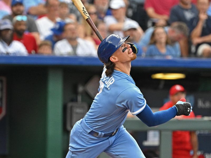 Aug 12, 2023; Kansas City, Missouri, USA;  Kansas City Royals shortstop Bobby Witt Jr. (7) doubles in the third inning against the St. Louis Cardinals at Kauffman Stadium. Mandatory Credit: Peter Aiken-USA TODAY Sports