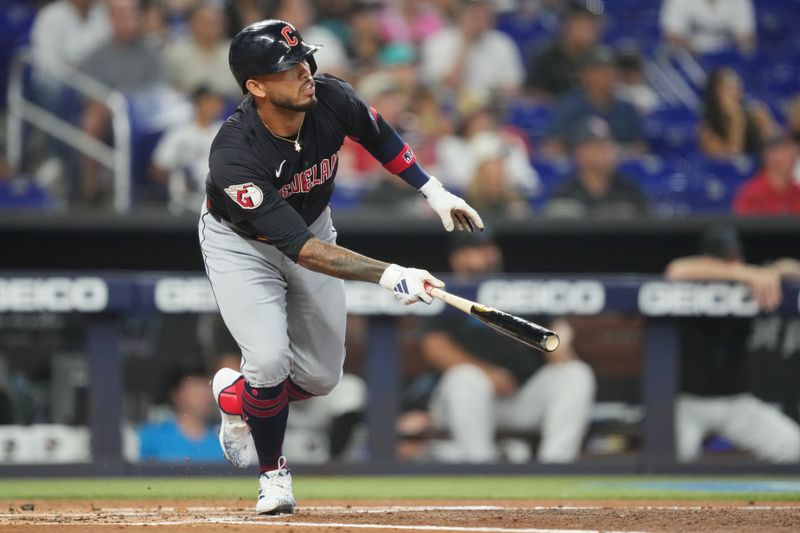 Jun 9, 2024; Miami, Florida, USA; Cleveland Guardians designated hitter Gabriel Arias (13) watches his home run leave the ballpark against the Miami Marlins in the second  inning at loanDepot Park. Mandatory Credit: Jim Rassol-USA TODAY Sports